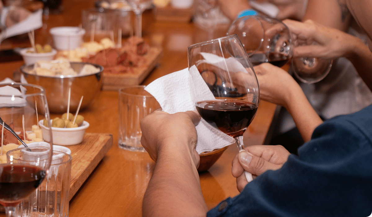 drinking wine at the table